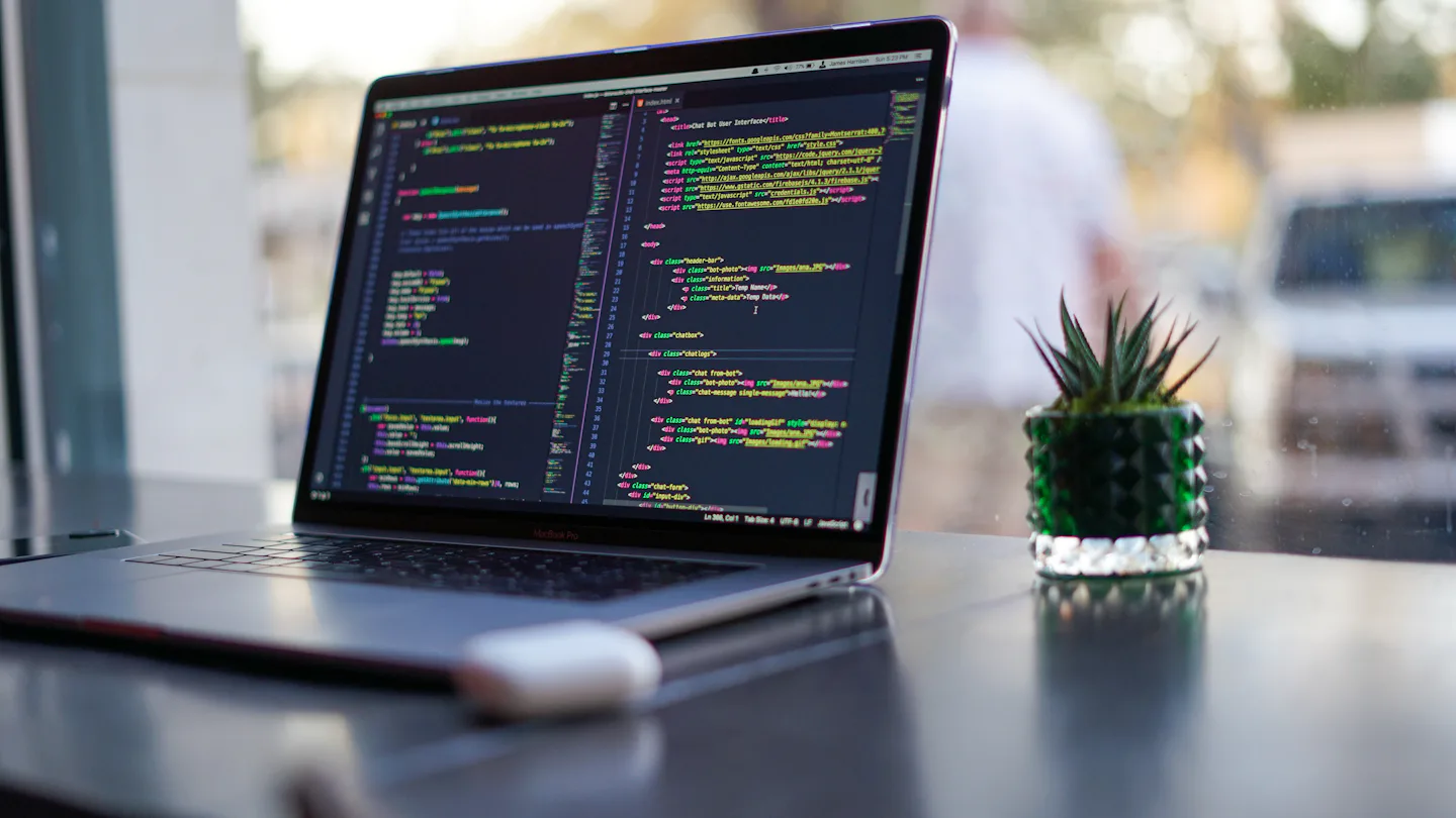 Laptop screen showing application source code